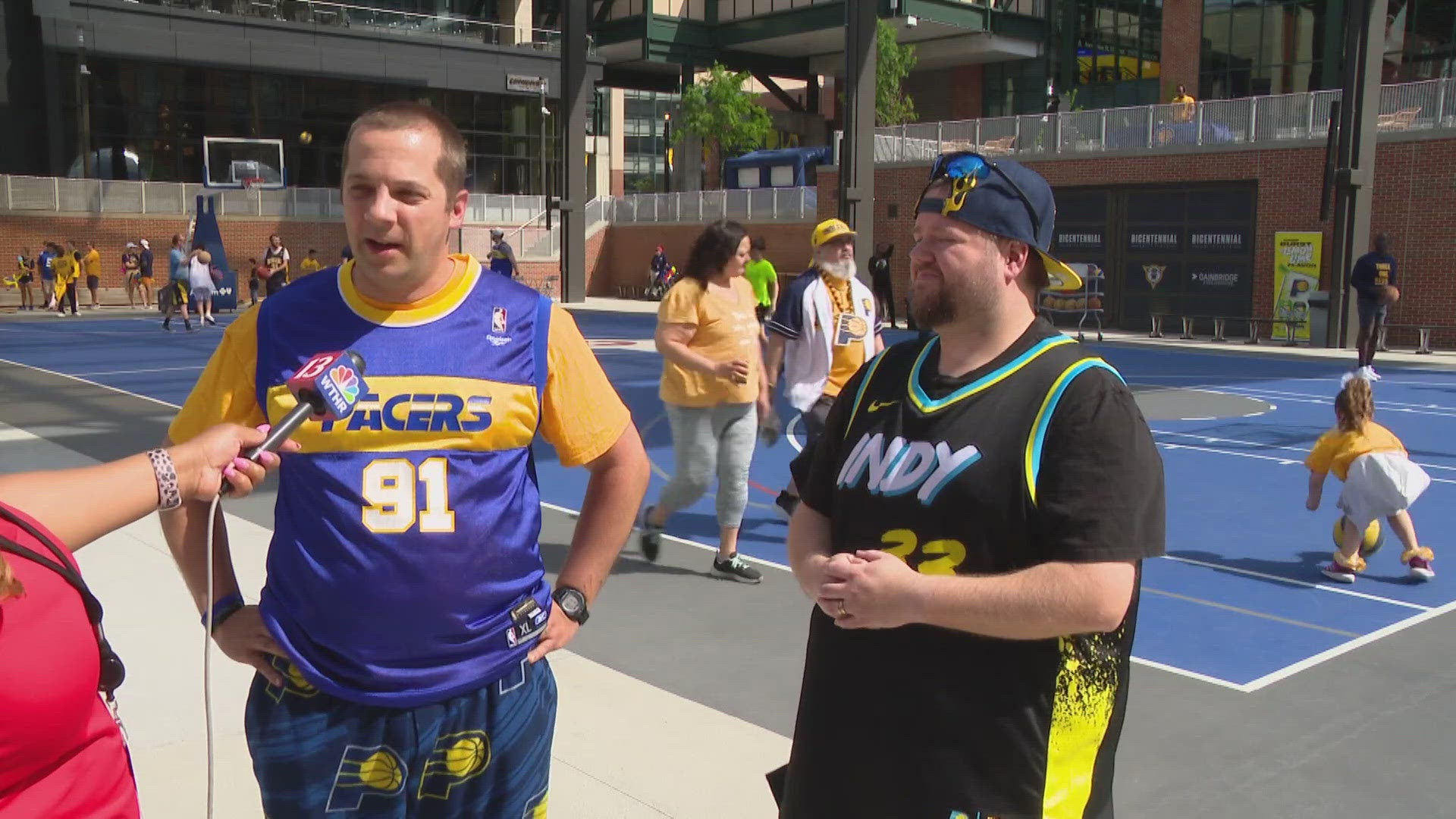 13News reporter Logan Gay talks with Pacers fans ahead of Game 4 of their first-round NBA playoff game against the Milwaukee Bucks.