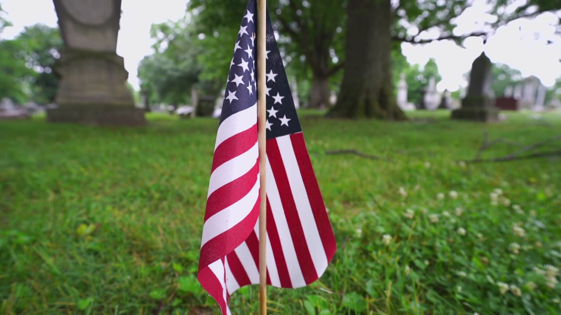 Dozens of people gathered at Crown Hill Cemetery on Memorial Day to remember those who gave their lives while serving the country.