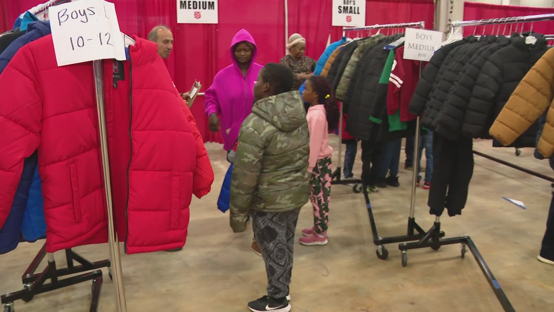 13News reporter Matthew Fultz talks with some of the families that benefitted from the Salvation Army's annual Coats for Kids drive.