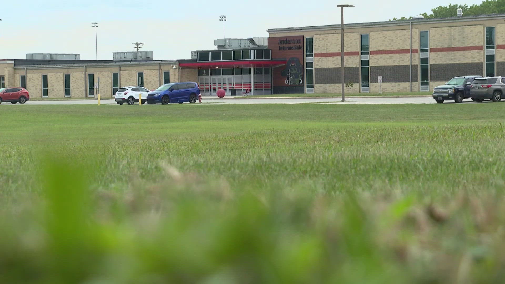 The interpreter also allegedly pulled the girl's hair and hit her with a ruler, according to police.