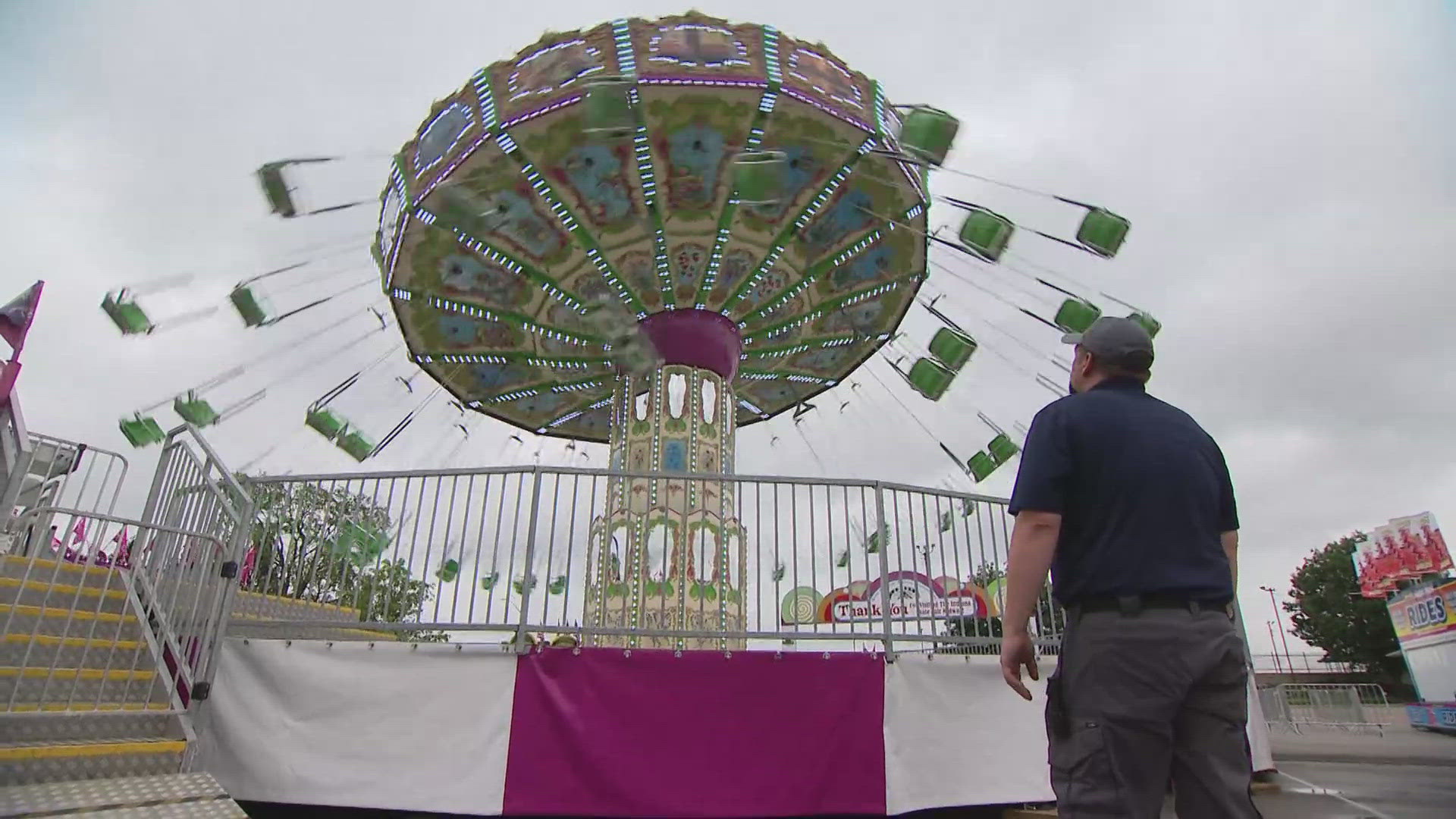 13News reporter Marina Silva talks with ride inspectors ahead of the kickoff to the 2024 Indiana State Fair.