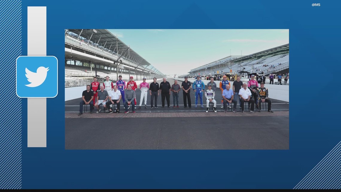 Nearly 2 dozen racing legends pose for photo on Yard of Bricks