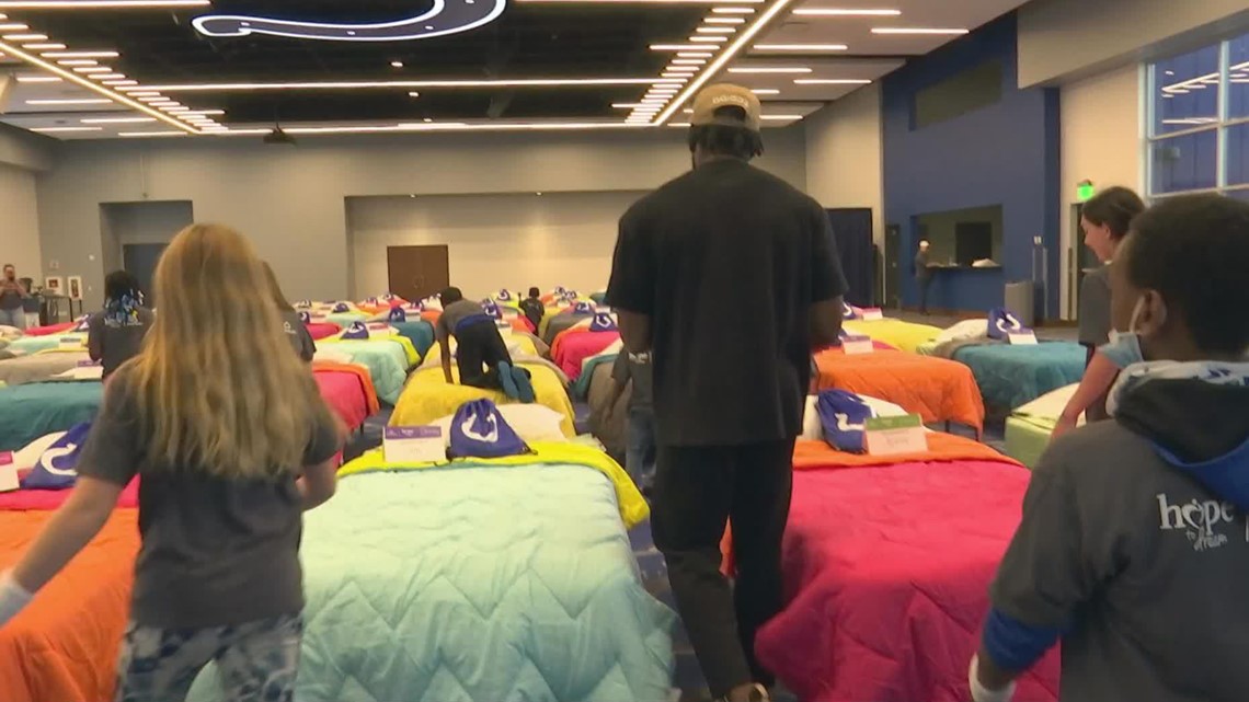 Colts' Kenny Moore II surprises 60 kids with new beds