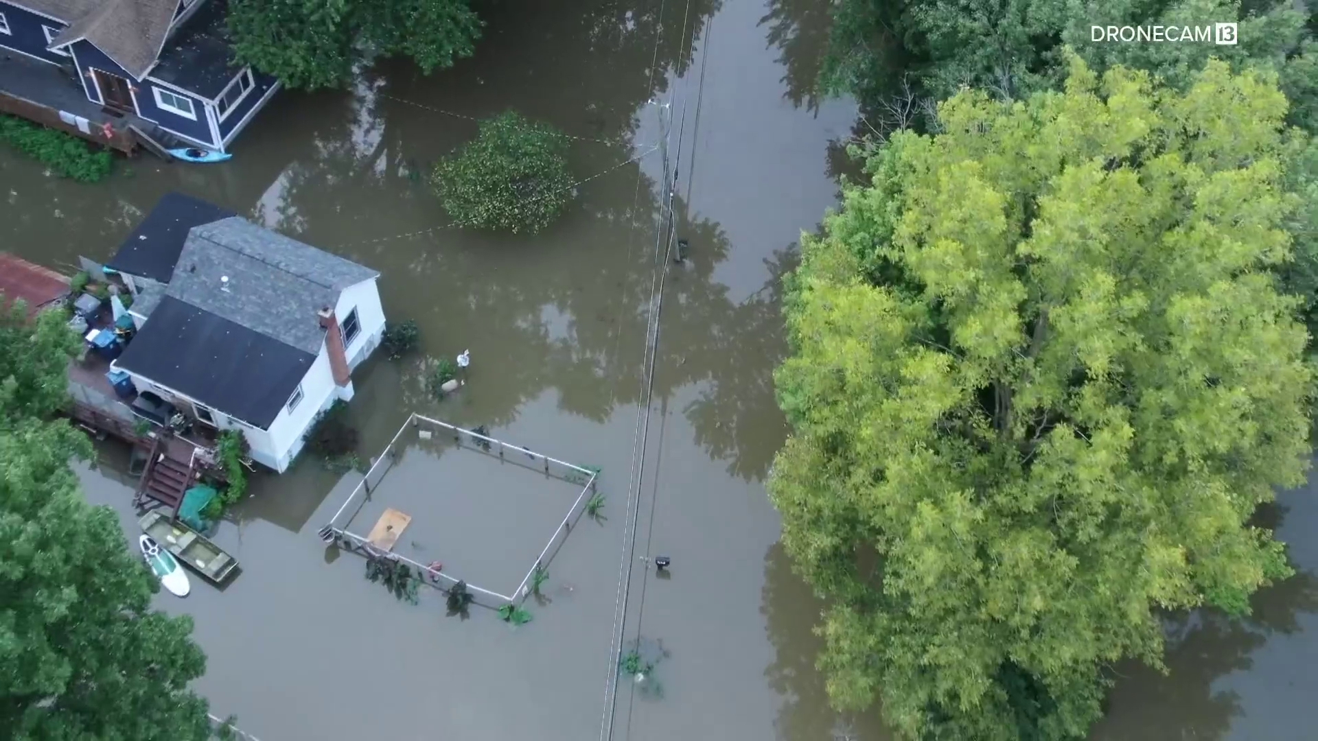 Historic flooding in Indianapolis's Ravenswood neighborhood prompts evacuations as White River expected to crest at record 16.53 feet