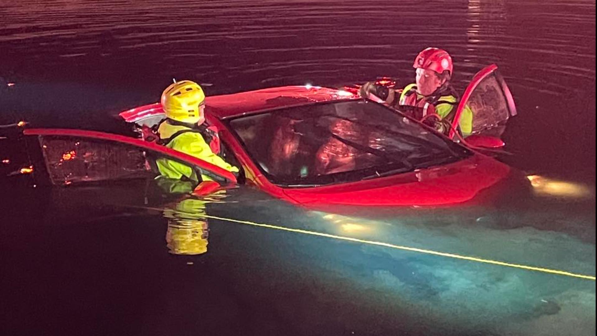 2 people rescued after car crashes into pond in Greenfield | wthr.com