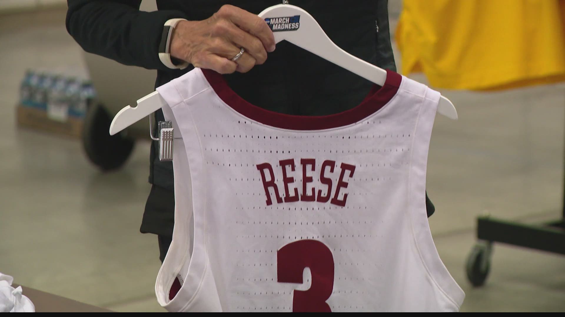 Mary Milz gives us an inside look at the volunteers helping make sure the March Madness teams have clean uniforms to compete in.