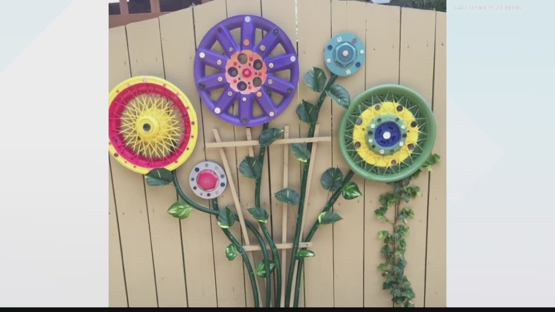 A local family is bringing joy to friends and neighbors with "fence flowers," created with hub caps, buttons and paint.