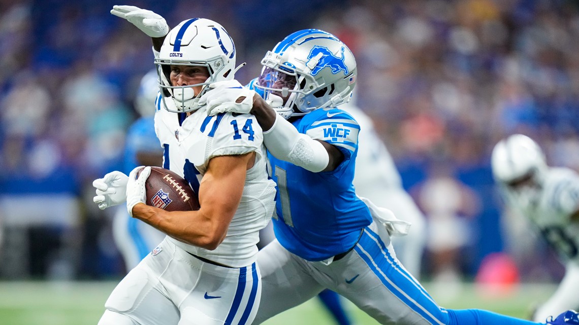 Detroit Lions wide receiver Tom Kennedy (85) makes a catch for a touchdown  over Indianapolis Colts cornerback Tony Brown (38) during first half of an NFL  preseason football game in Indianapolis, Saturday