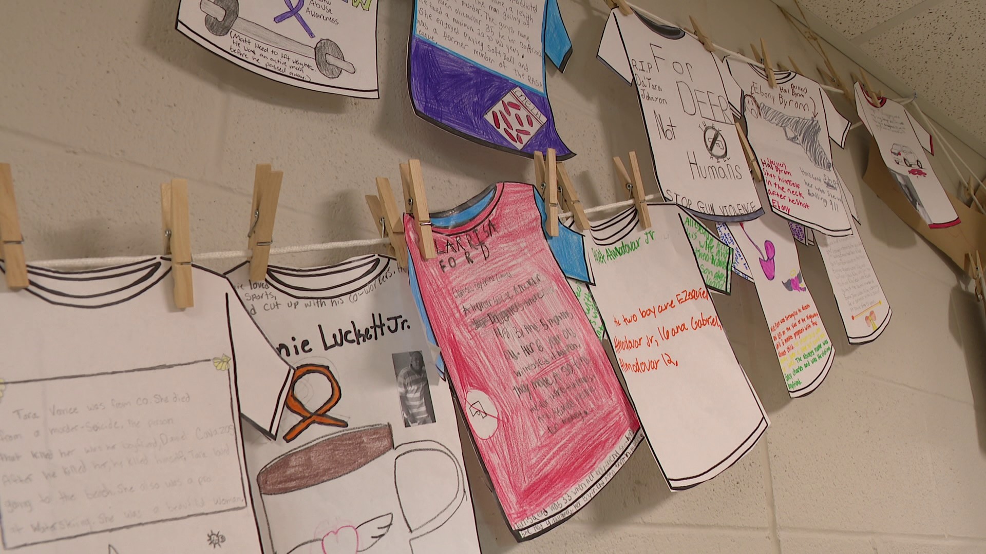 Students in the new classes designed paper T-shirts, each honoring a domestic violence victim, telling their real-life tragic and fatal story.