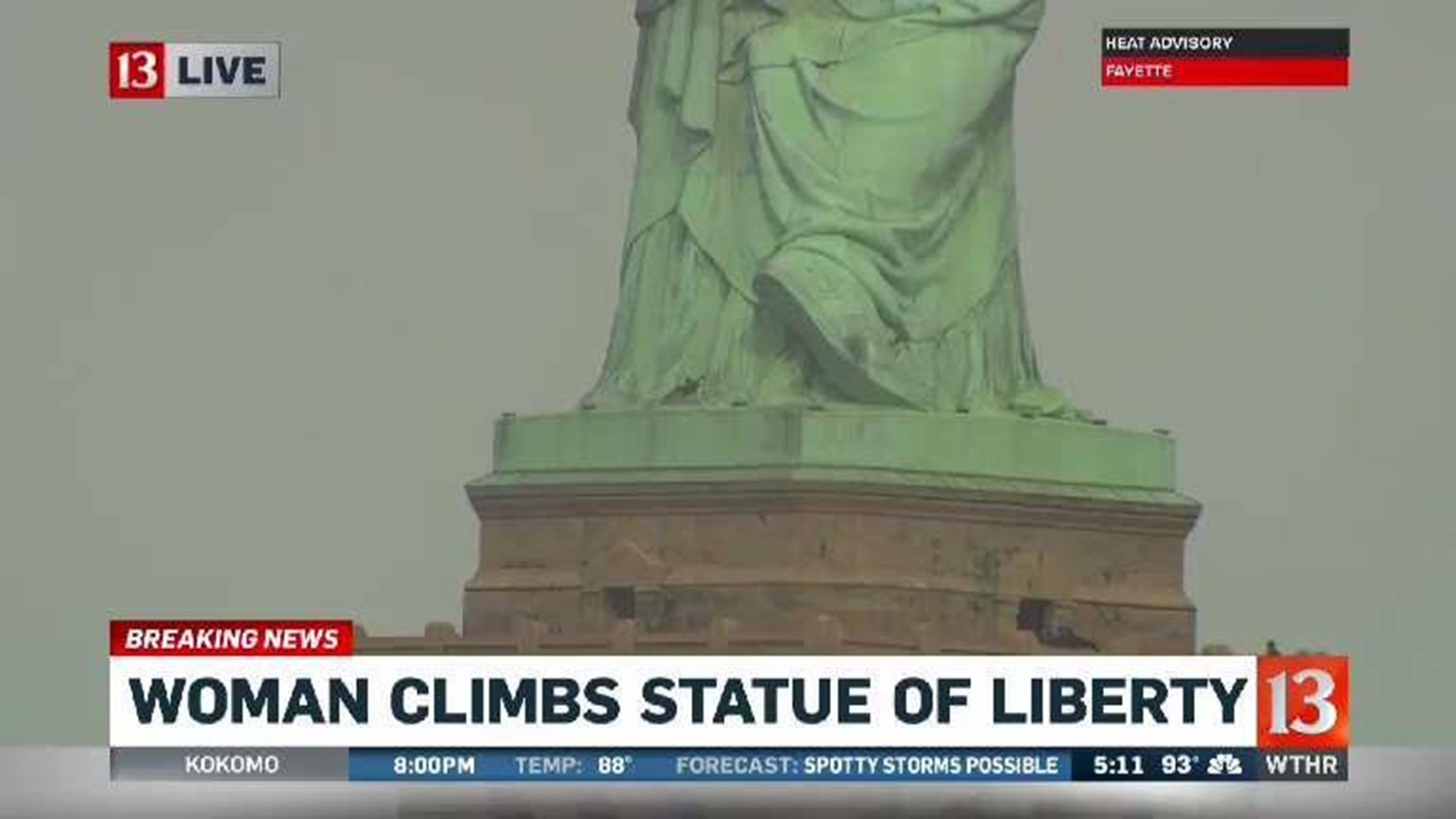 Woman attempts to scale Statue of Liberty | wthr.com