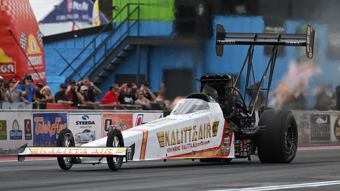 Shawn Langdon breaks the NHRA speed record by reaching 345 mph in his Top Fuel dragster