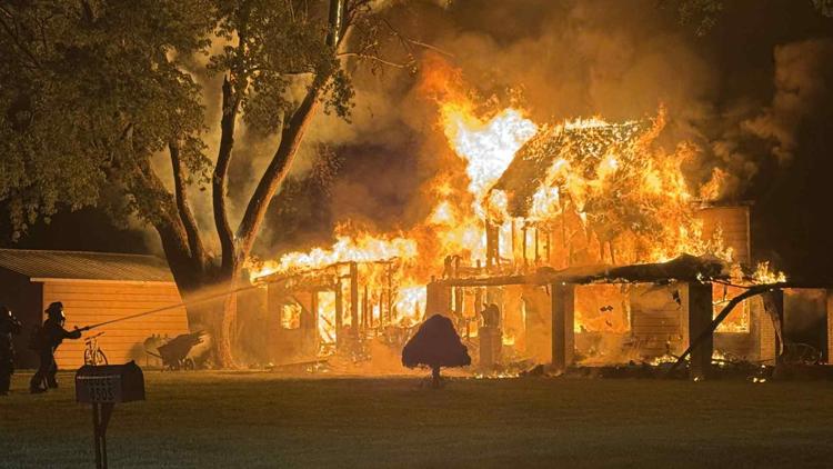 Massive fire destroys Tipton County home while residents were out of town