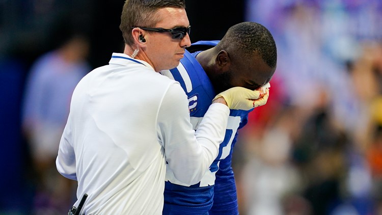 Colts' Leonard makes season debut, then suffers concussion