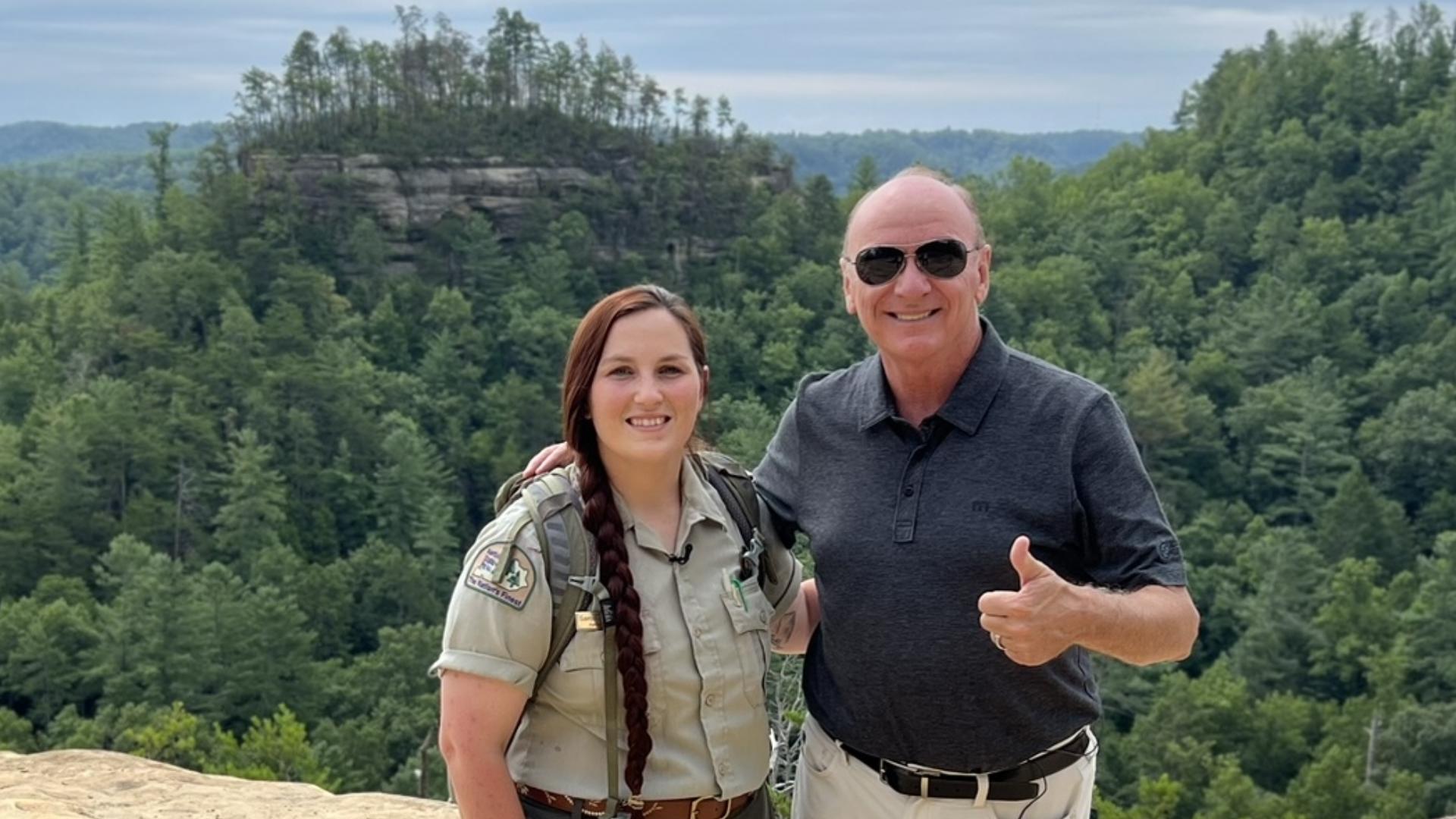 Naturalist Supervisor Samantha Evans talks with Chuck at the top of the skylift at Red River Gorge.