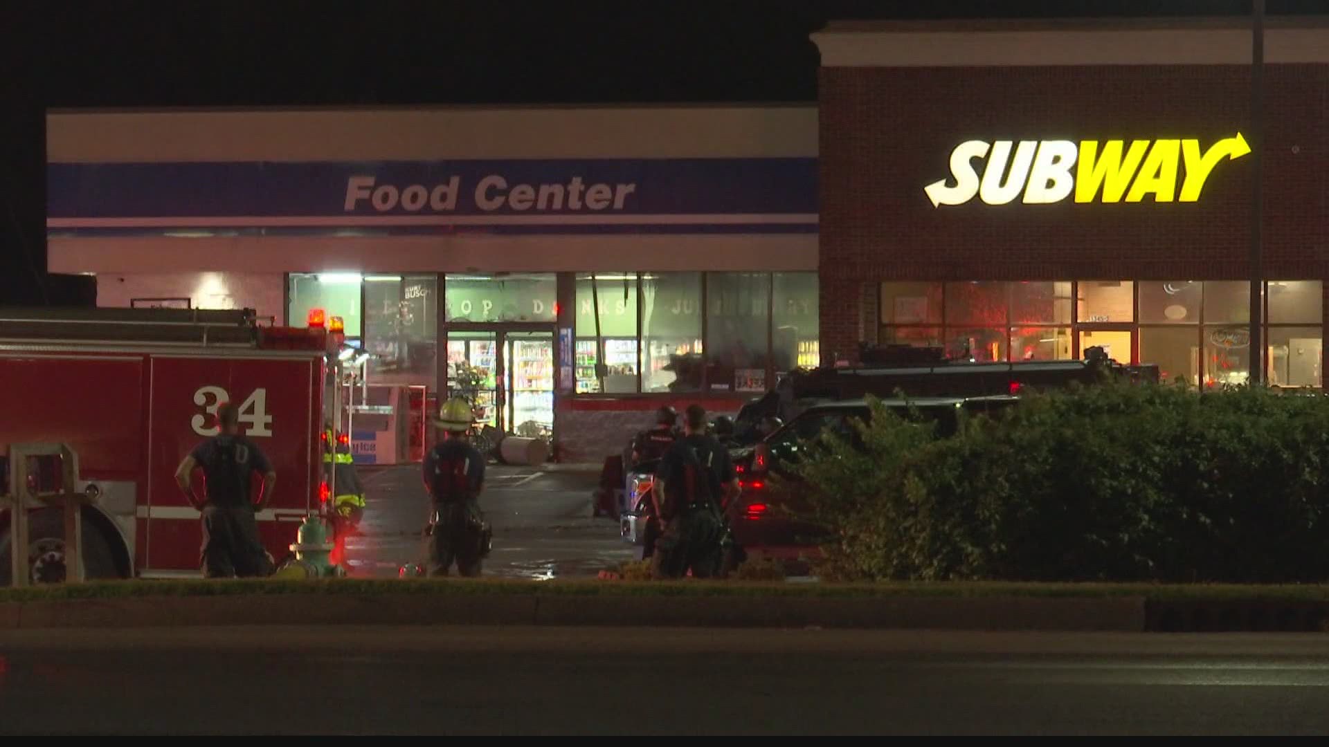 A man fired a rifle into a south side convenience store then set it on fire, according to witnesses.