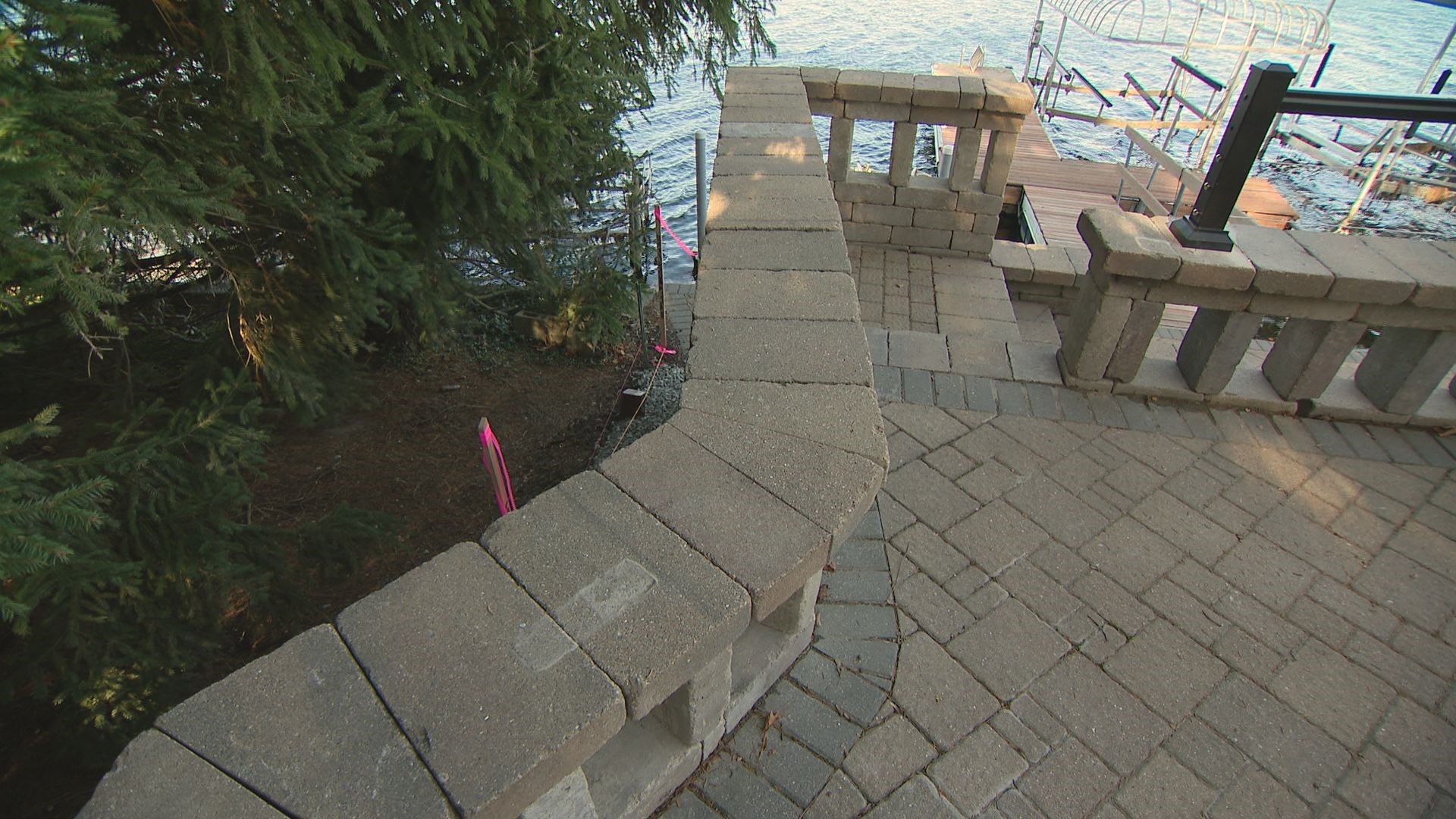 The Pecks agreed to pay $2,000 in fines for not getting the required permits, and they also agreed to make slight adjustments to the patio.