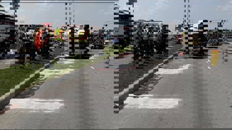Semi carrying forklift batteries overturns, spilling battery acid into road and drainage system on Indy’s west side