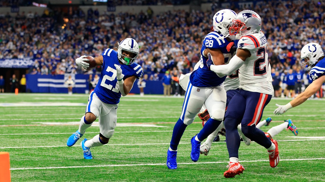 INDIANAPOLIS, IN - DECEMBER 18: Indianapolis Colts Running Back Nyheim  Hines (21) warms up for the NFL football game between the New England  Patriots and the Indianapolis Colts on December 18, 2021