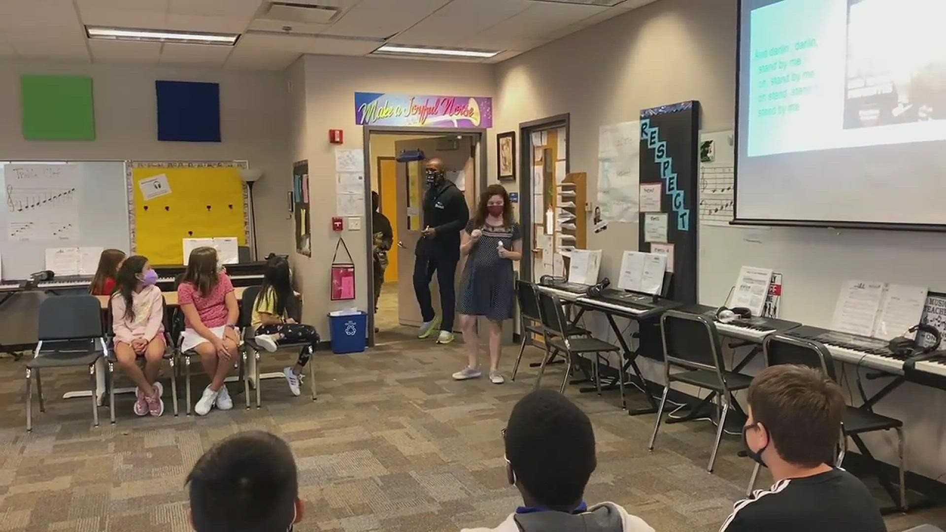 After spending the last year in Kuwait, a mom surprised her daughter during class at Fall Creek Intermediate School in Fishers.