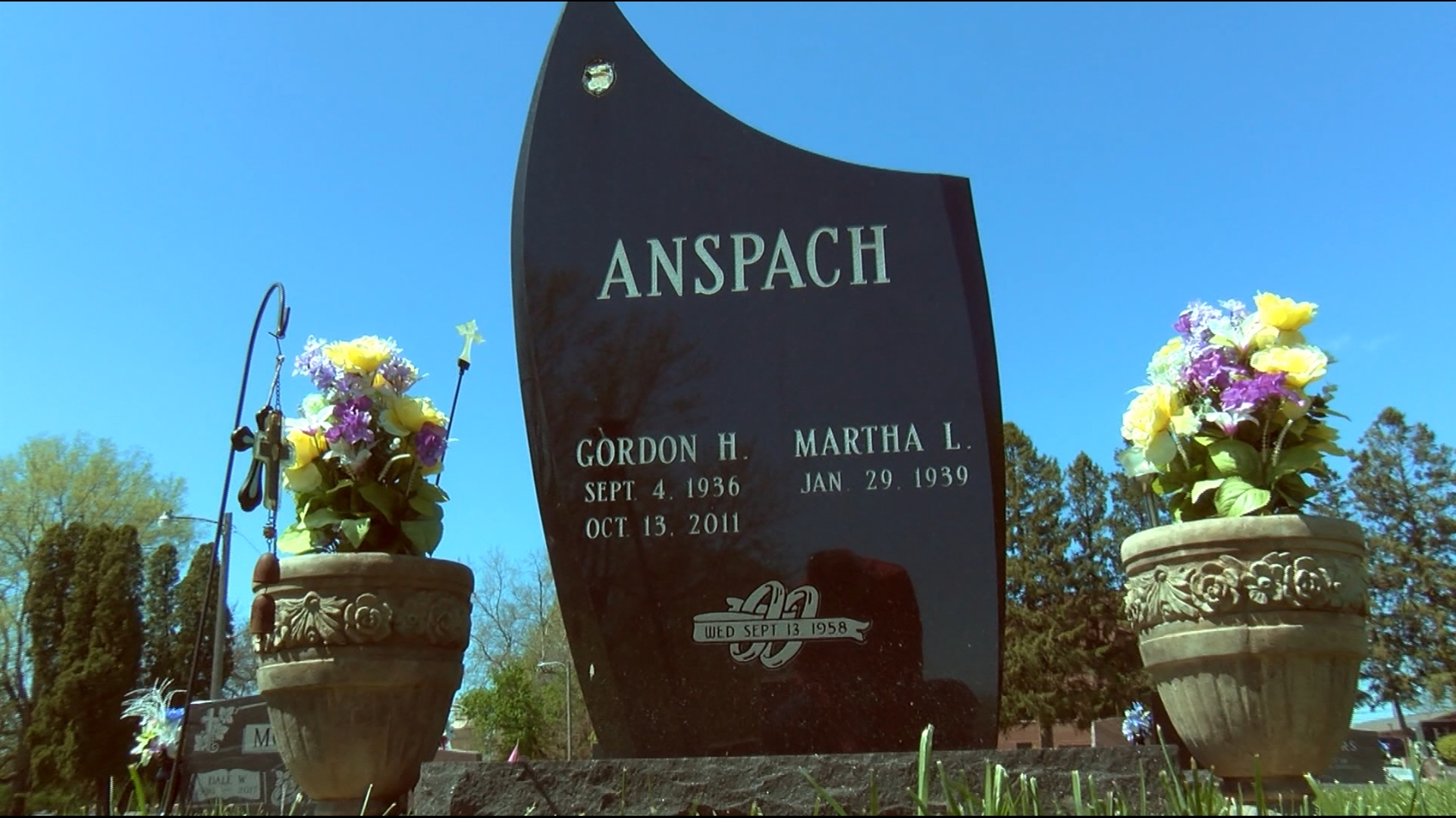 Police in Columbia City, Indiana are searching for whoever stole a badge from the headstone of former police chief Gordon Anspach.