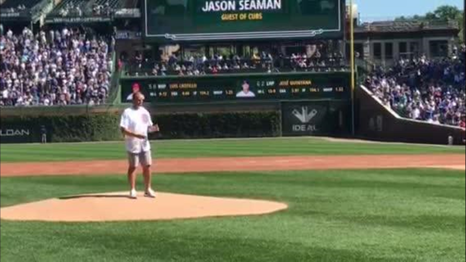 Jason Seaman throws first pitch at Cubs game