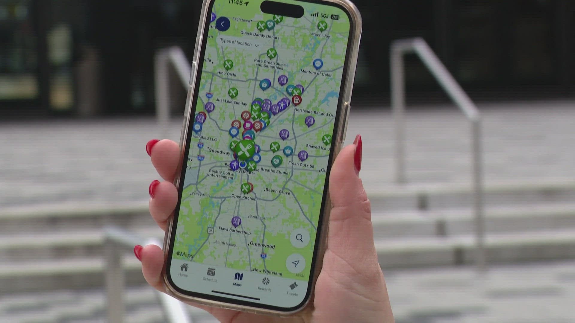 The app shows a map of the state with restaurants, bars, shops and iconic basketball venues.  In return, fans earn rewards by checking in.