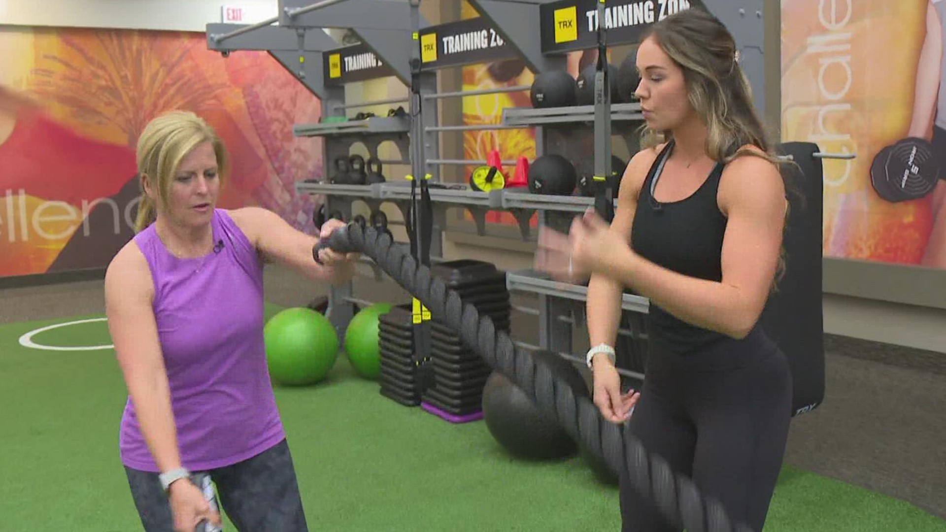Trainer Lydia Horner at LA Fitness explains how to use battling ropes.