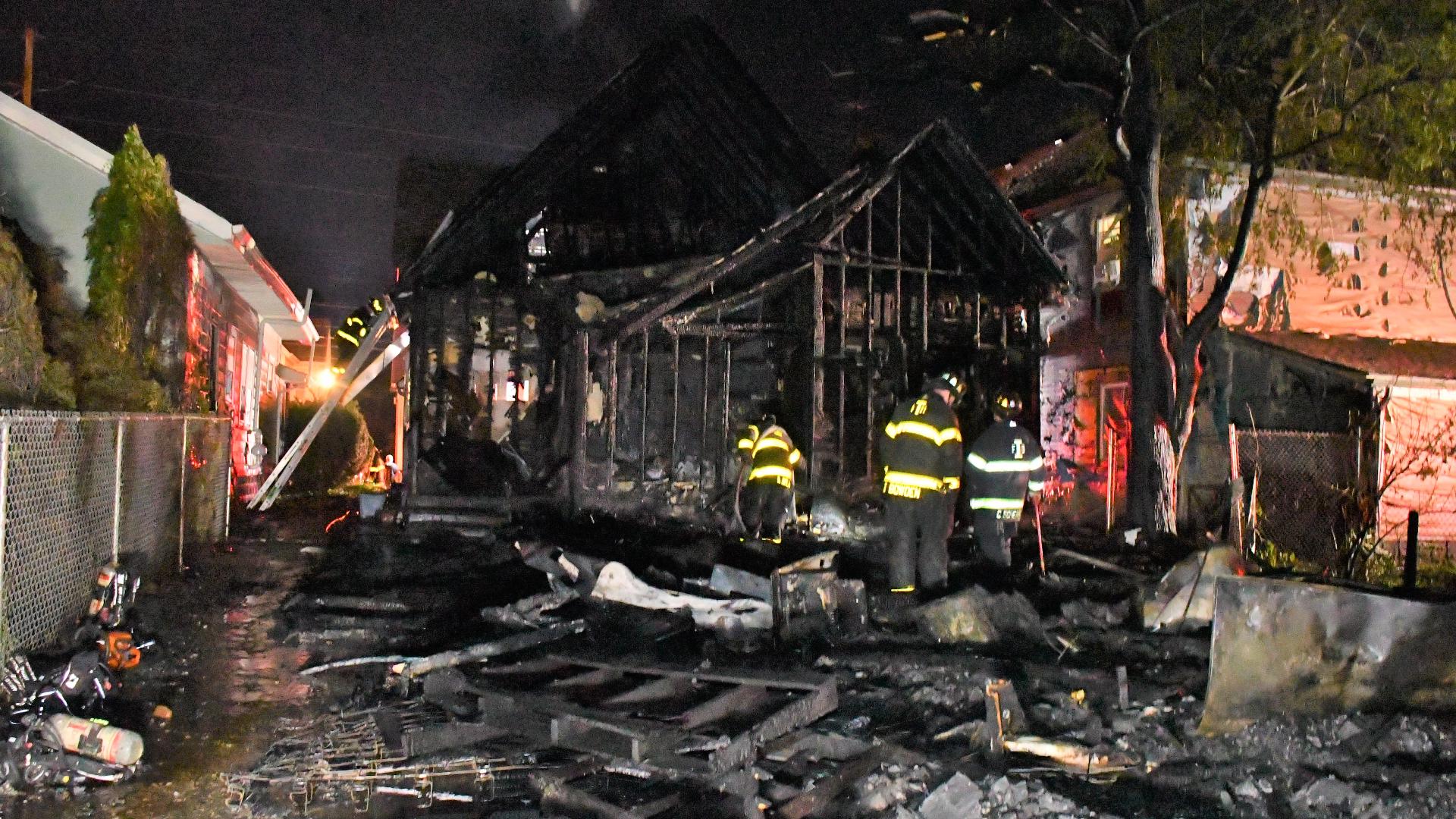 Woman charged with arson after fire at vacant home on Indy's southwest ...