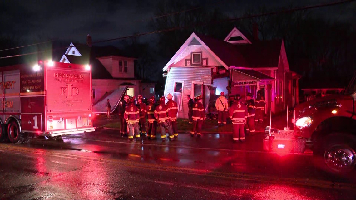 Driver hospitalized after pickup truck crashes into 2 homes on Indianapolis' south side
