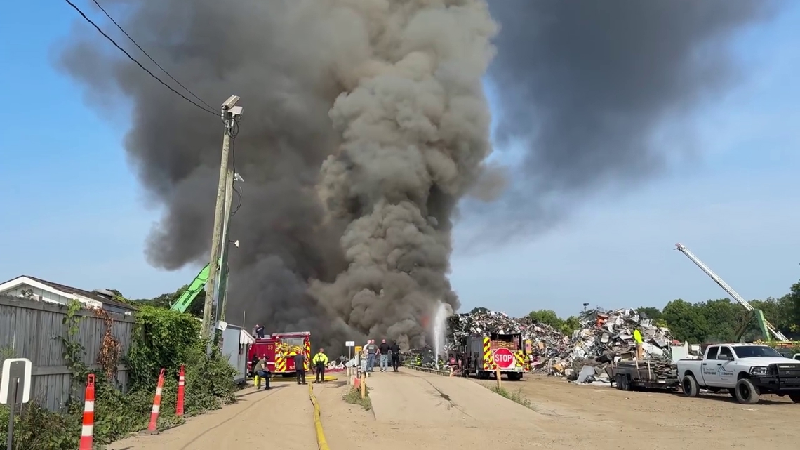 Crews knock down large fire at auto salvage yard on west side of Indianapolis