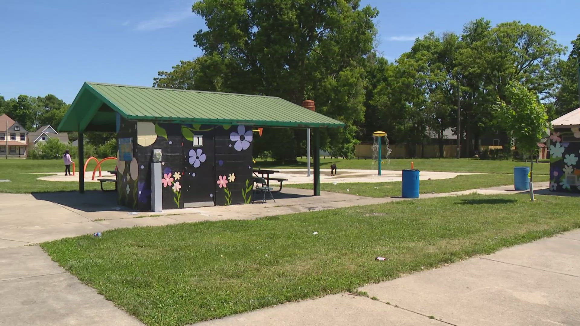 13News reporter Matthew Fultz speaks with neighbors who were in the area of Haughville Park during a shooting Tuesday night.