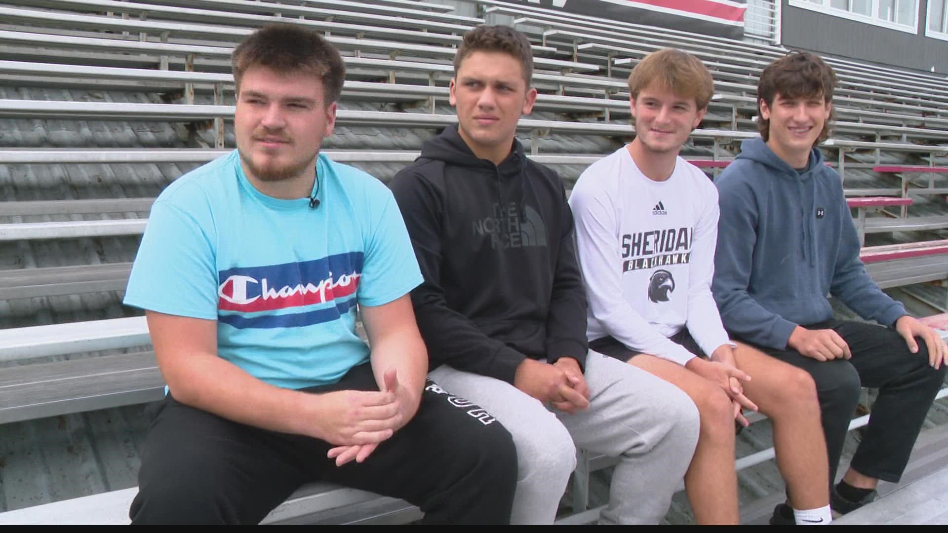 Four Sheridan students are raising money for the family of someone they've never met.