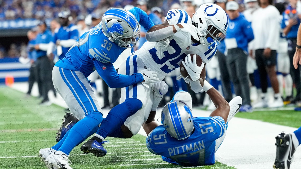 Detroit Lions running back Godwin Igwebuike (35) looks down the field after  a play during the second half of an NFL preseason football game between the Detroit  Lions and the Indianapolis Colts