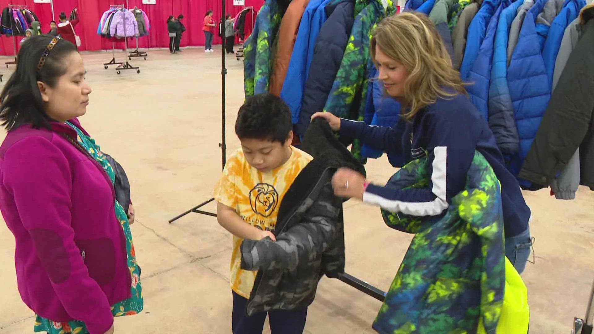 The 13News crew served as shoppers, helping kids pick out coats.
