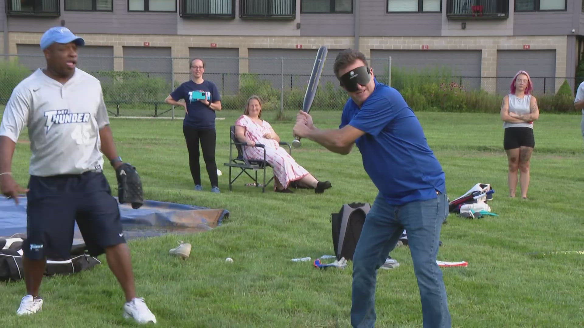 13Sports director Dave Calabro talks with the Indy Thunder Beep Ball team for the blind and visually impaired.