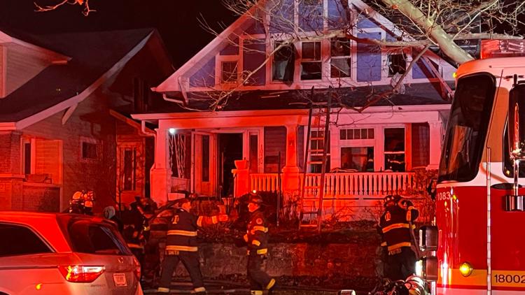 Woman and man rescued from roof during house fire on Indy’s near south side