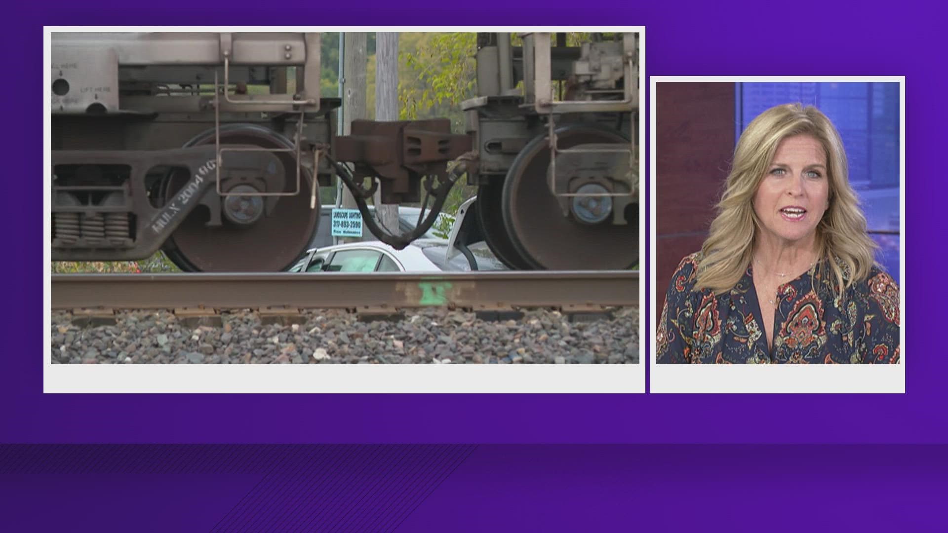 The woman was taking her kids to school when the car stopped on the train tracks due to stopped traffic in front of them.