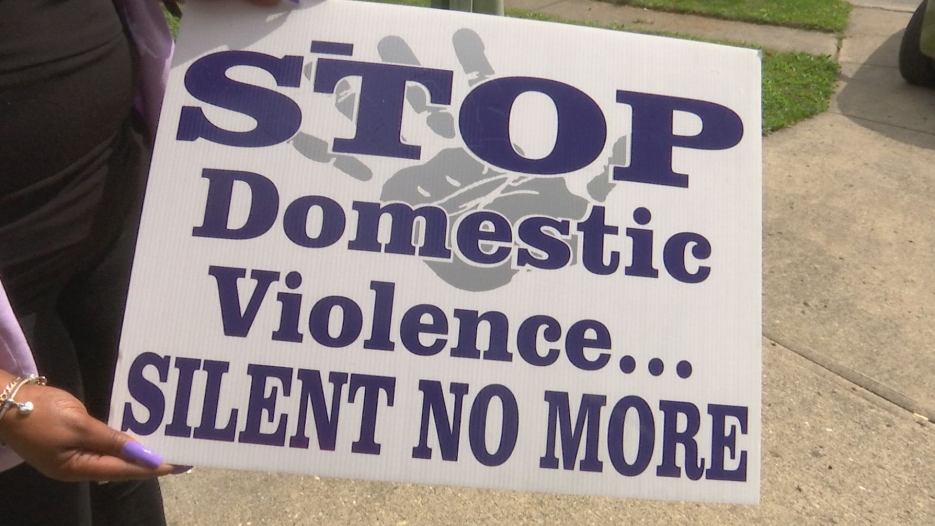 A survivor of domestic abuse and other advocates are calling for more funding to provide shelter and resources to survivors and to honor those who've died.