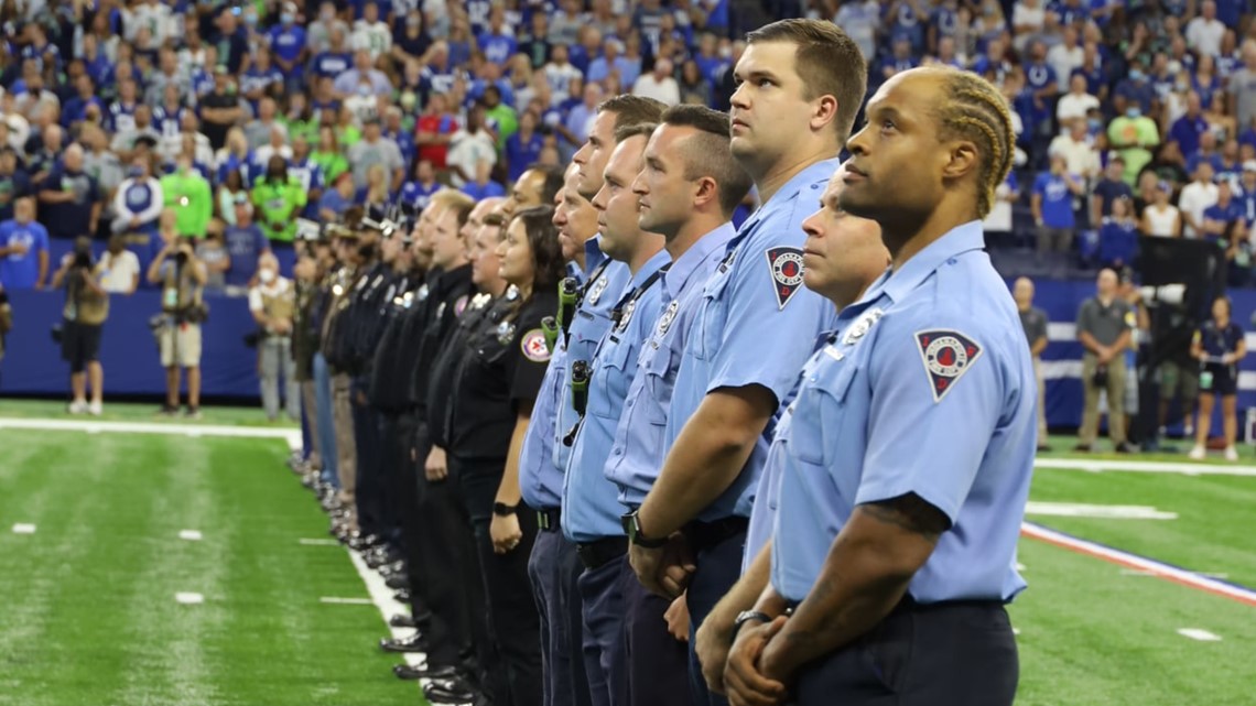 An Indianapolis Colts player warms up by a Salute to Service military  appreciation logo before an NFL football game against the Tennessee Titans  Thursday, Nov. 12, 2020, in Nashville, Tenn. (AP Photo/Ben