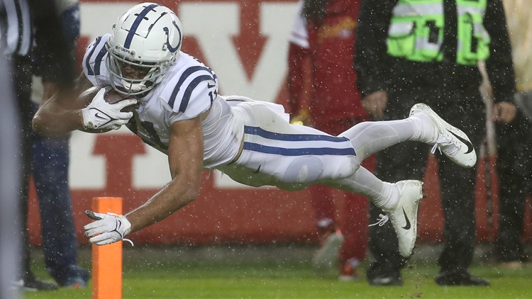 Colts overcome driving rain, send 49ers to fourth consecutive loss