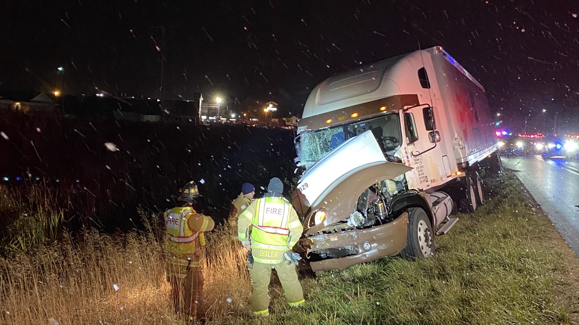 Semi truck and car crash, sending 12-year-old to hospital