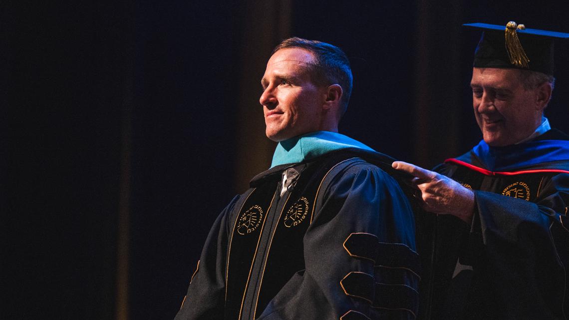 Legendary quarterback Drew Brees receives honorary degree from Purdue University during 2026 spring commencement ceremony