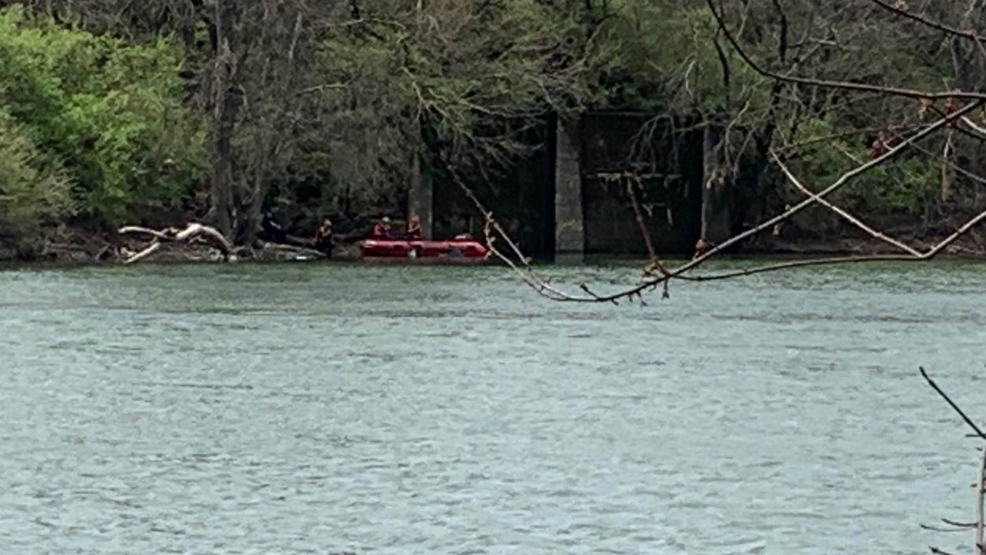 Authorities are working to identify a body found in the White River near the Indianapolis Zoo Tuesday, April 12, 2022.