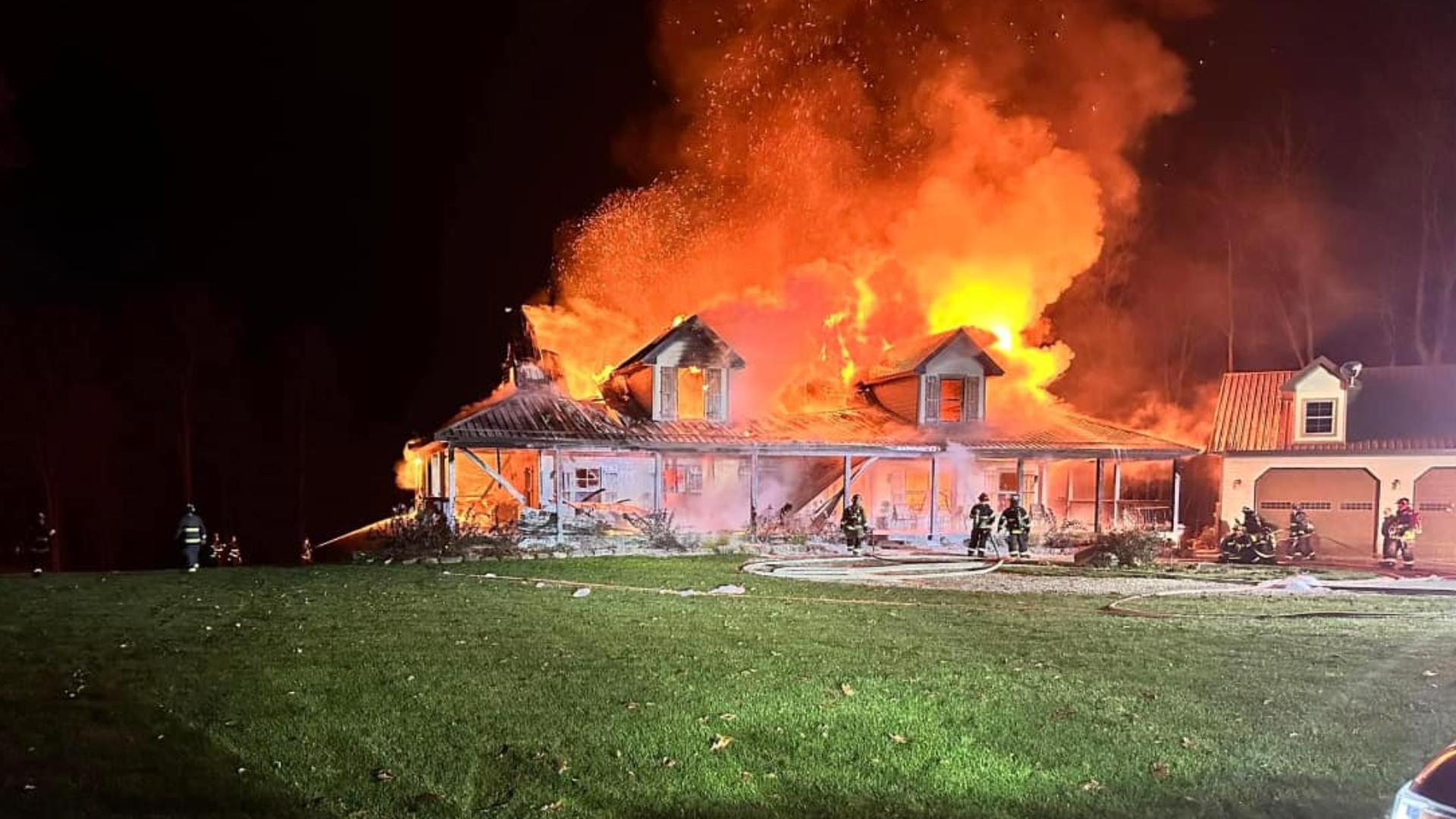 Firefighters were called to the home around 8 p.m. Saturday and saw flames shooting out of the roof.