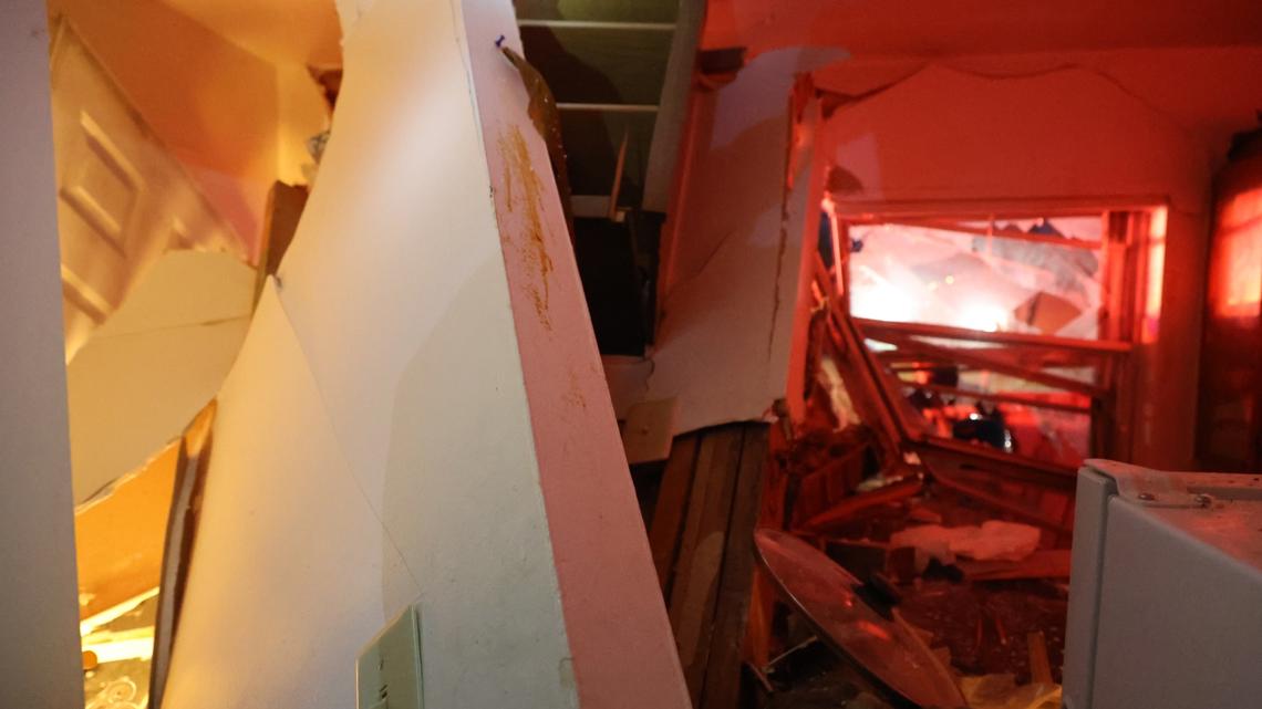 Truck crashes through family's kitchen on Indy's north side