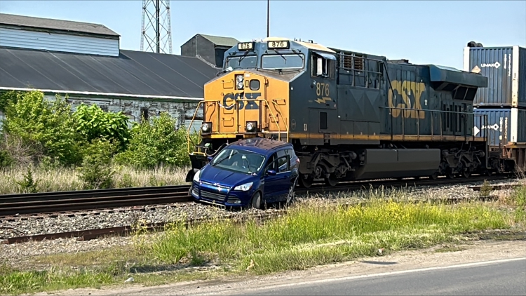 Driver injured after car struck by train on Indy’s near east side