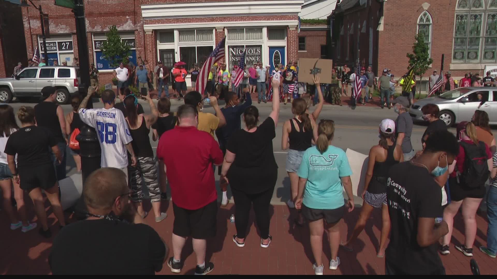 More than 100 people in support of the Black Lives Matter movement brought their message to Mooresville as part of the March on the Suburbs.