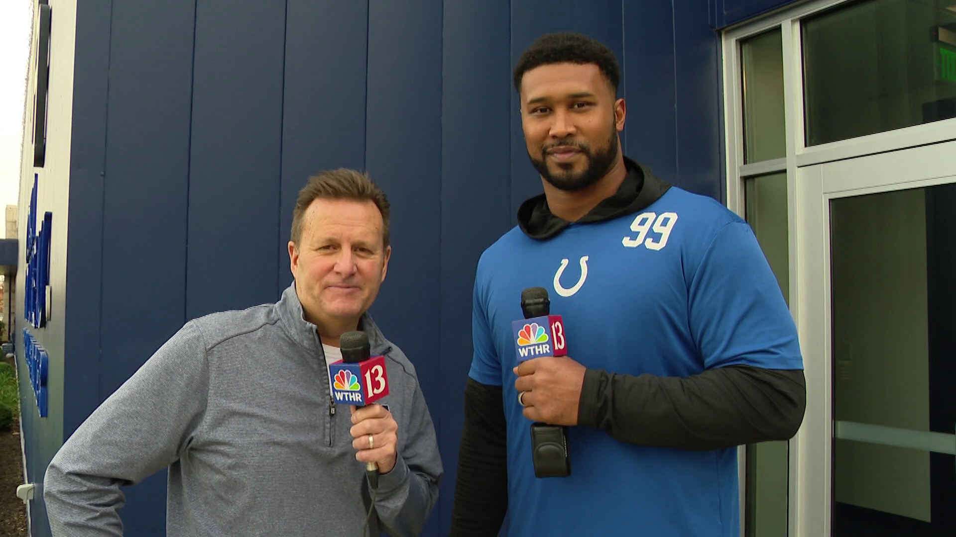 Dave Calabro talks with Indianapolis Colts defensive tackle DeForest Buckner before Sunday's game against the New York Jets.