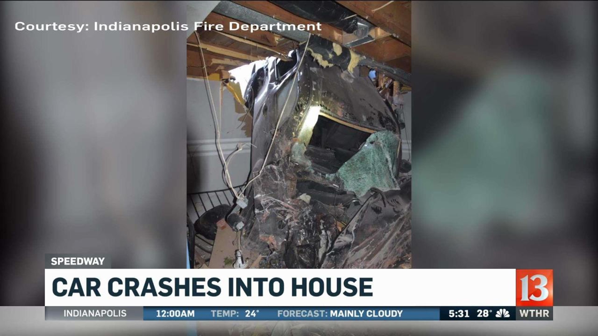 Car lands in basement of Speedway home