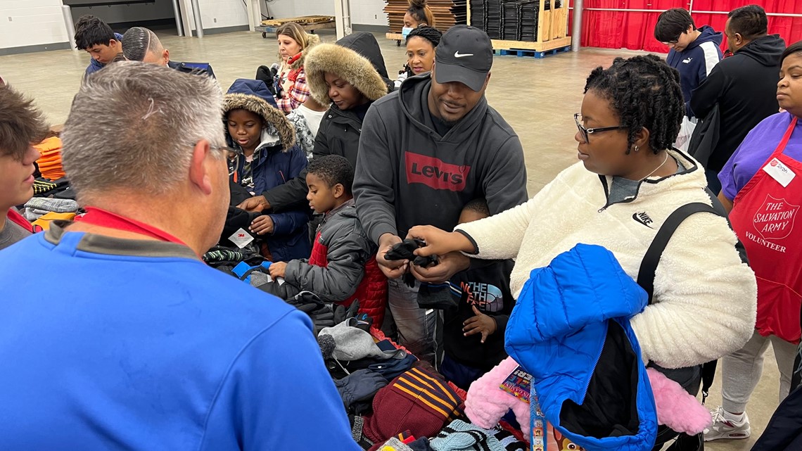 Colts visit IPS school to deliver winter coats, hats